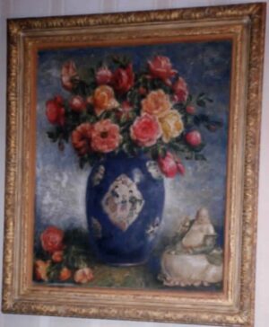 Variety of Roses in a Blue Chinese Vase with Buddha Statuette
